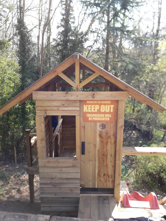Entrance to the tree house with keep out sign