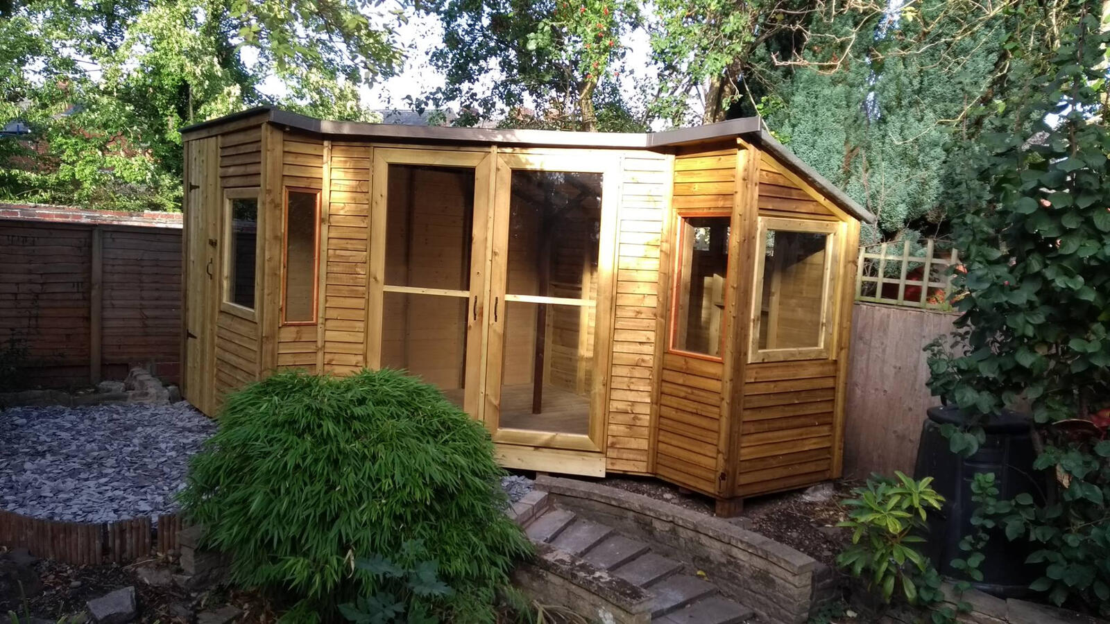 Summer house in the garden setting