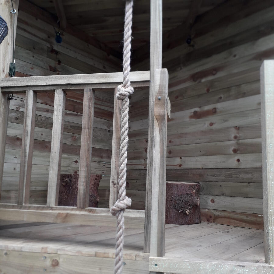 The upper deck with tree stump seats