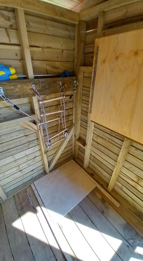 Rope ladder stowed away and trapdoor closed