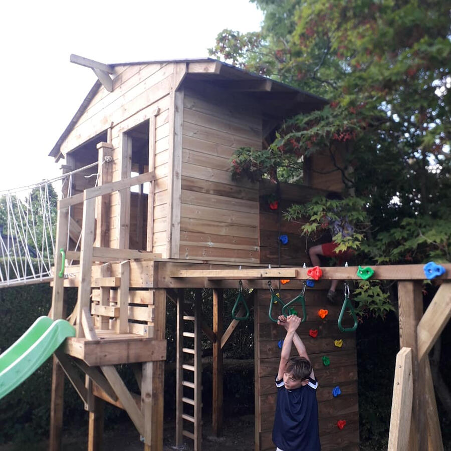 Tree house rope bridge