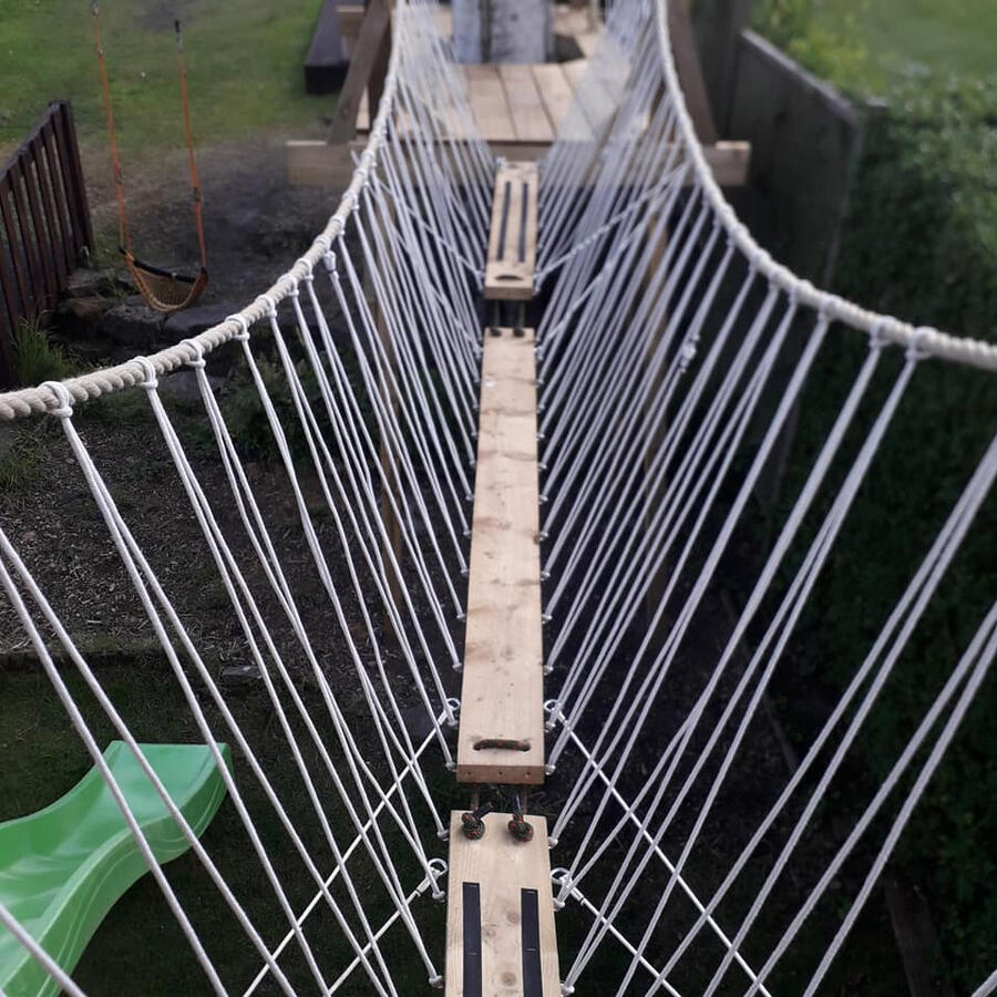 Tree house rope bridge