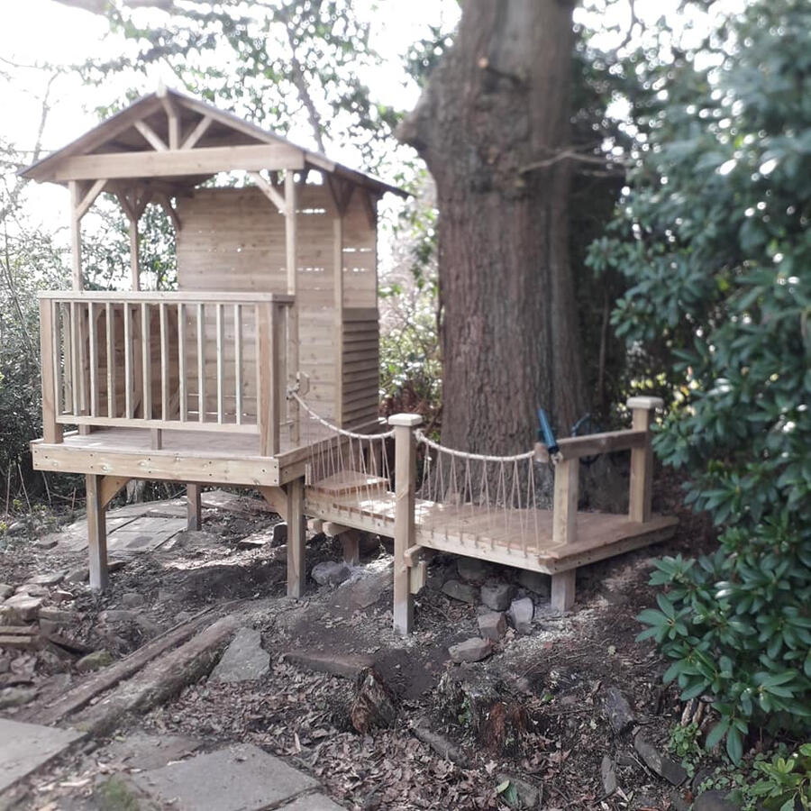 Tree house rope bridge